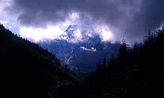 Big Four trying to peek its peak out of the clouds