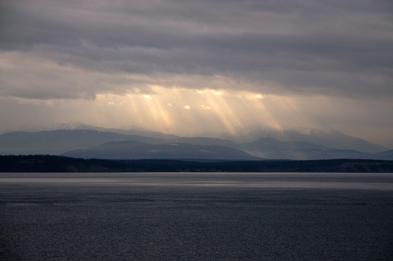 Sunrays over the Olympics.
