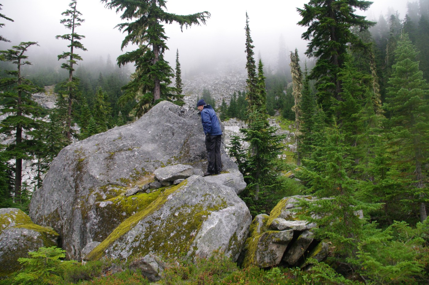 Jim poking around the boulders near camp