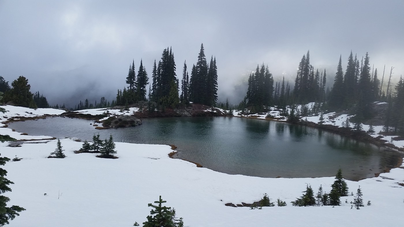 Pretty mountain lake alongside the trail