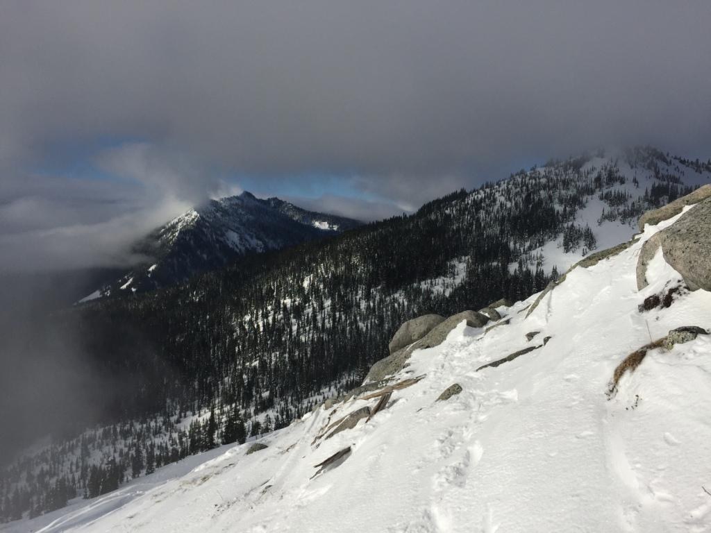Rainier was visible earlier but I waited til I got higher to take out the camera. Mistake, as the clouds moved in. This is one of the few clear shots I got when I turned around at 5,300 ft.