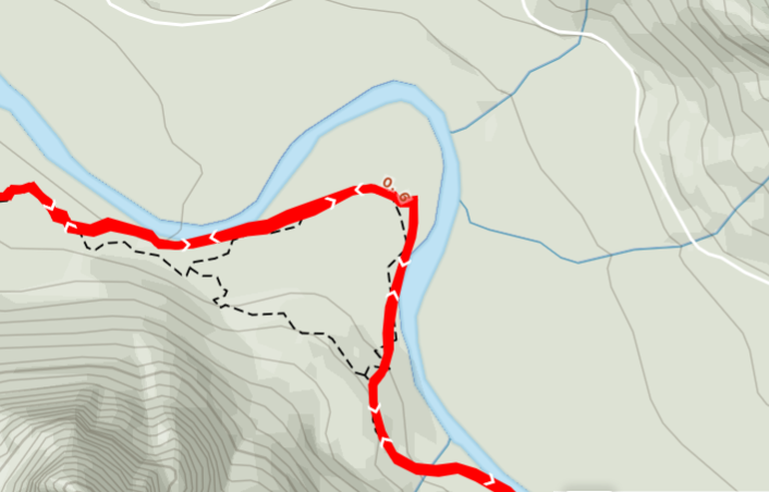 Unmaintained trail that dips down to the river