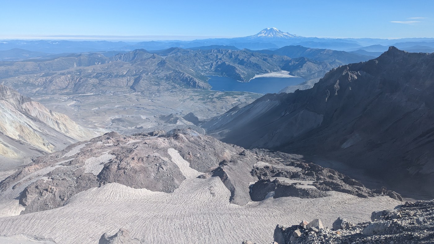 View looking north from the crater rim; Spirit Lake and Mt. Rainier visible