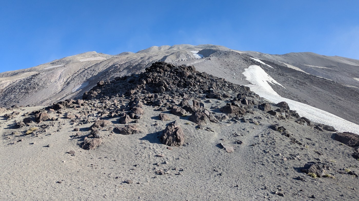 The uppermost section of the mountain through the dust and ash.