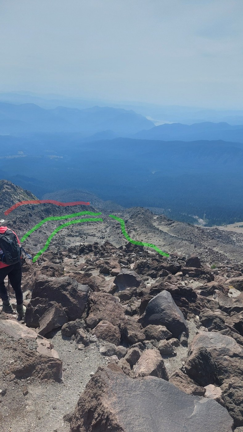A look back down at the long chute that begins just after your first rock ascent after the forest.  There are many ways we could have come up, but these are less visible when you are down at the start. I marked three seemingly more travelled paths in green, and the pole marked ridge path in red.  Choose your own adventure.